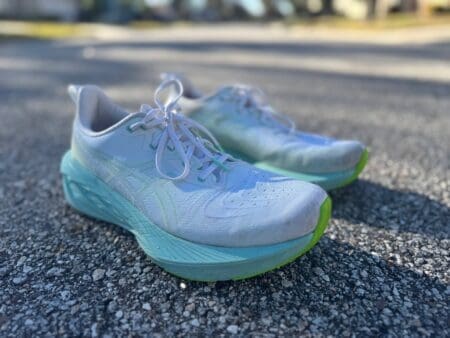 ASICS Novablast 4 Review: Still Worth It vs. The Novablast 5? Asics Novablast 4 shoes on pavement