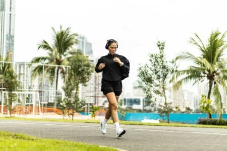 girl running outside in direct sunlight
