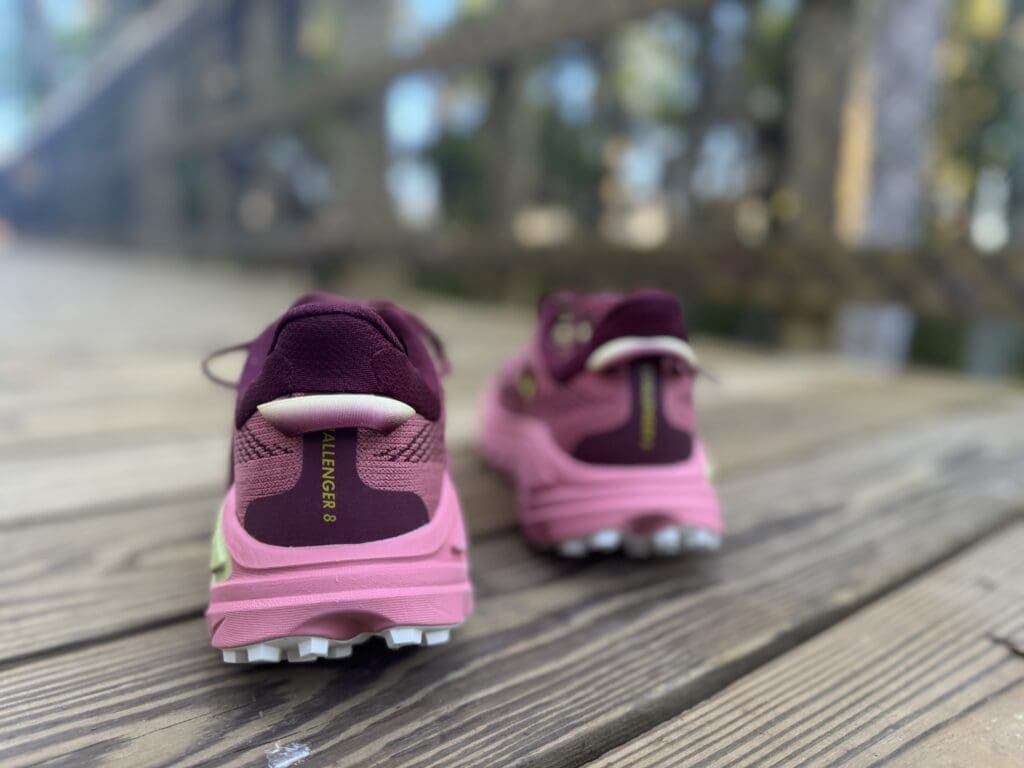 Hoka Challenger 8 heel on trail bridge