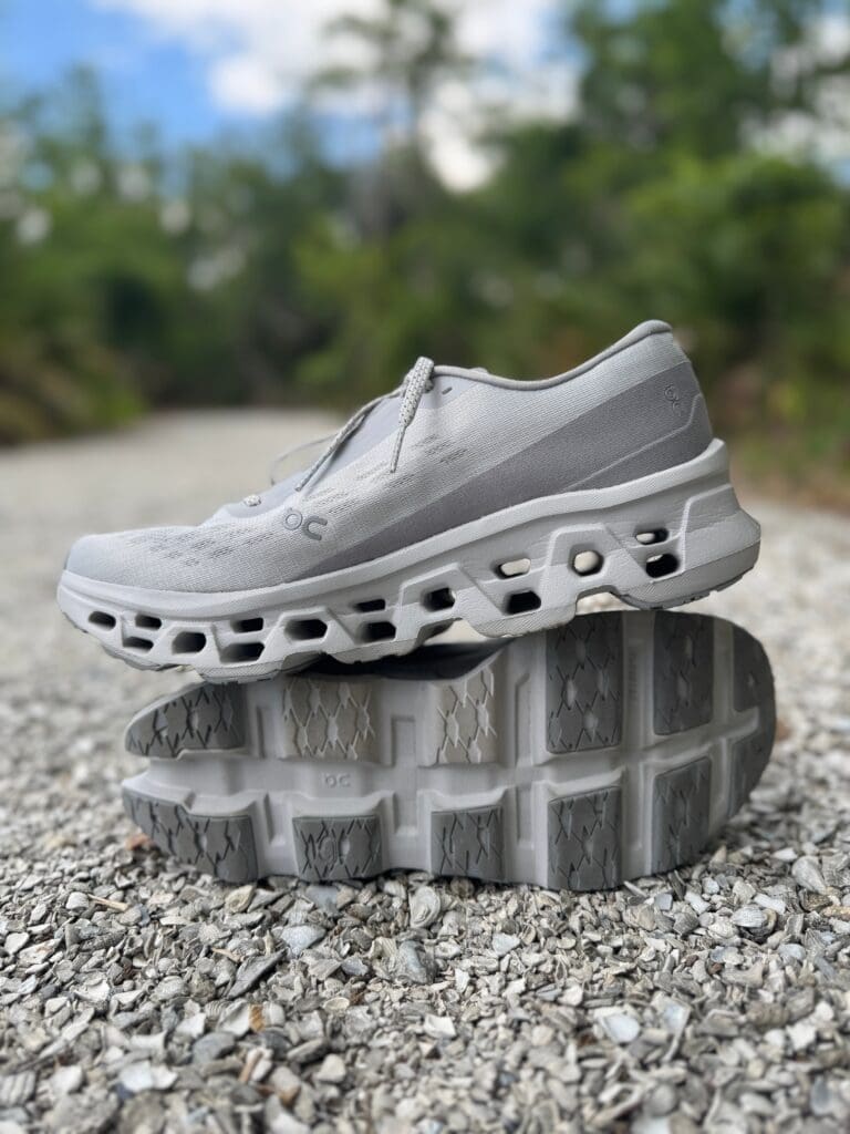 On Cloudmonster 3 stacked on top of each other on gravel running path