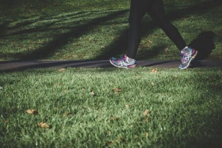 person walking for health and weight loss who works from home and is walking 10k steps a day to stay healthy and active