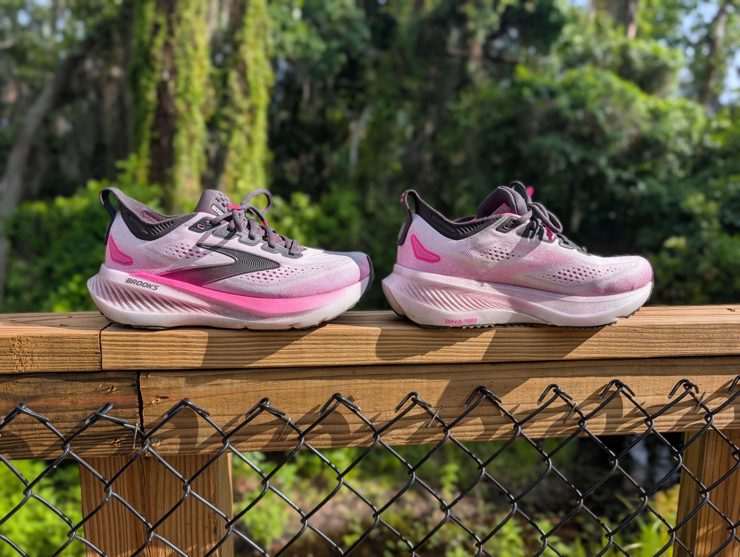 Pink Glycerin 23s on a trail bridge ledge in front of each other