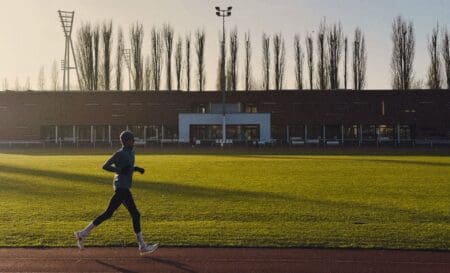Man running outside in adidas running shoes