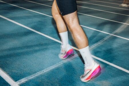 8 Best Nike Running Shoes (2026): The Ultimate Buyer’s Guide athlete wearing nike running shoes on track