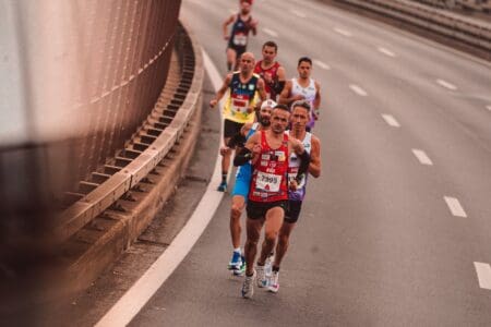 8 Best Super Trainers of 2026: Ultimate Buying Guide Athletes wearing super trainers during 5k race