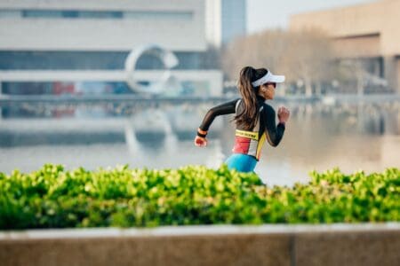 7 Best Running Shoes for Flat Feet: Pain-Free Daily Support girl running pain free outside