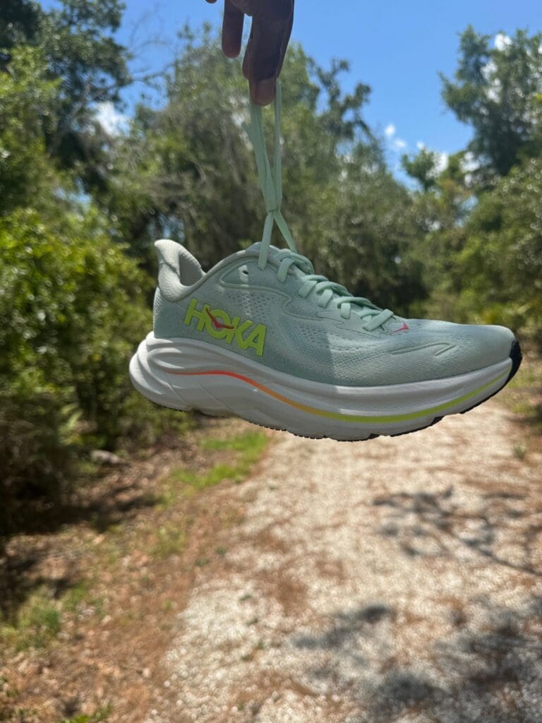 HOKA Clifton 10s hanging by shoe laces