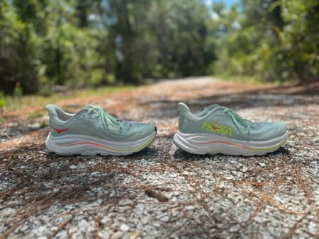 HOKA Clifton 10 Review: Bigger Stack, Steeper Drop, Better Ride? Hoka Clifton 10 side by side on running path