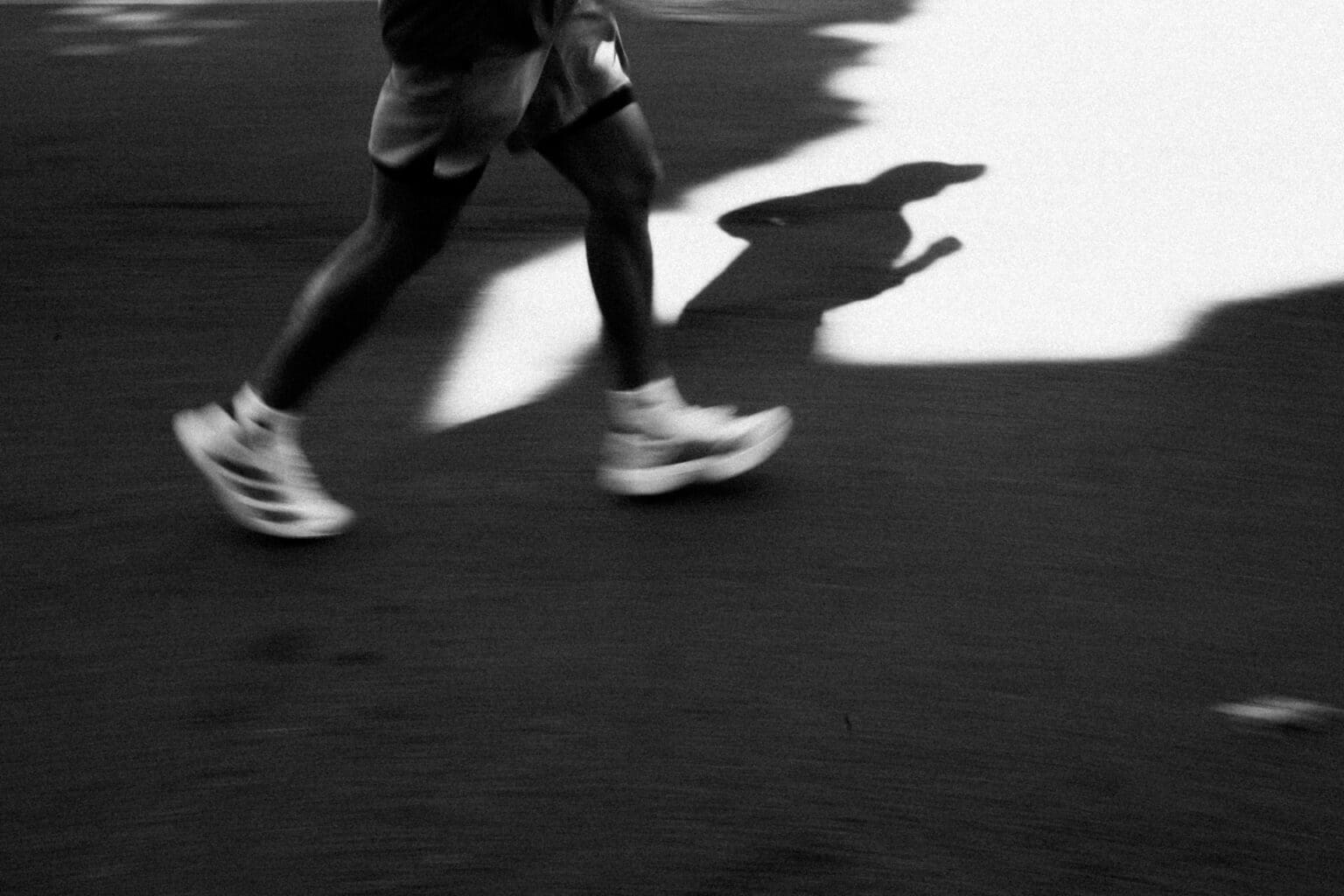 Running Shoe Drop Explained: How Heel-to-Toe Drop Affects Your Stride and Joints man running in stride