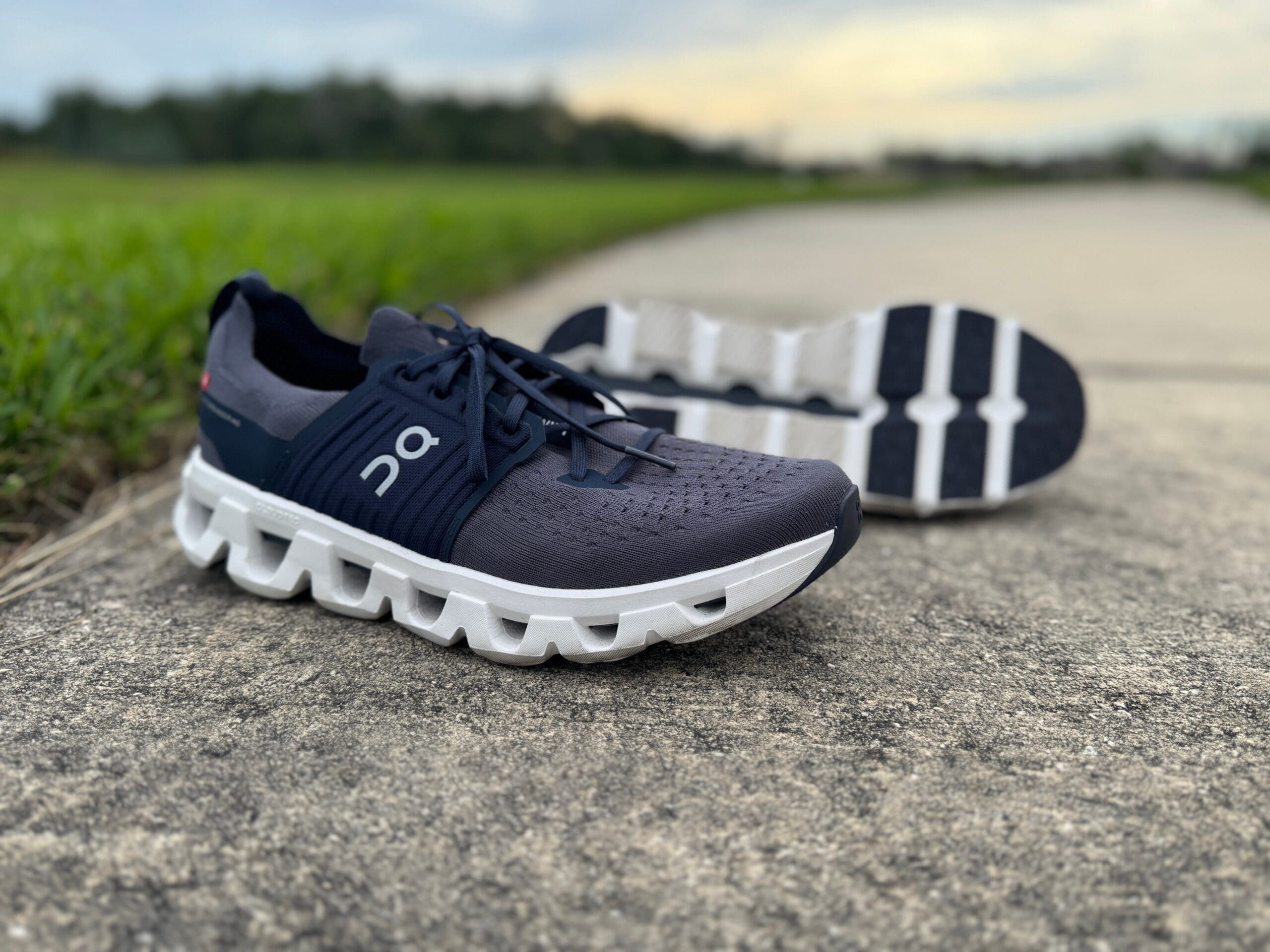 On Cloudswift 4 laying on running path showing side of shoe