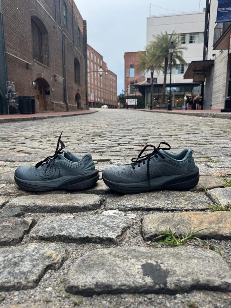 Topo Athletic Phantom 4 in street with city in background