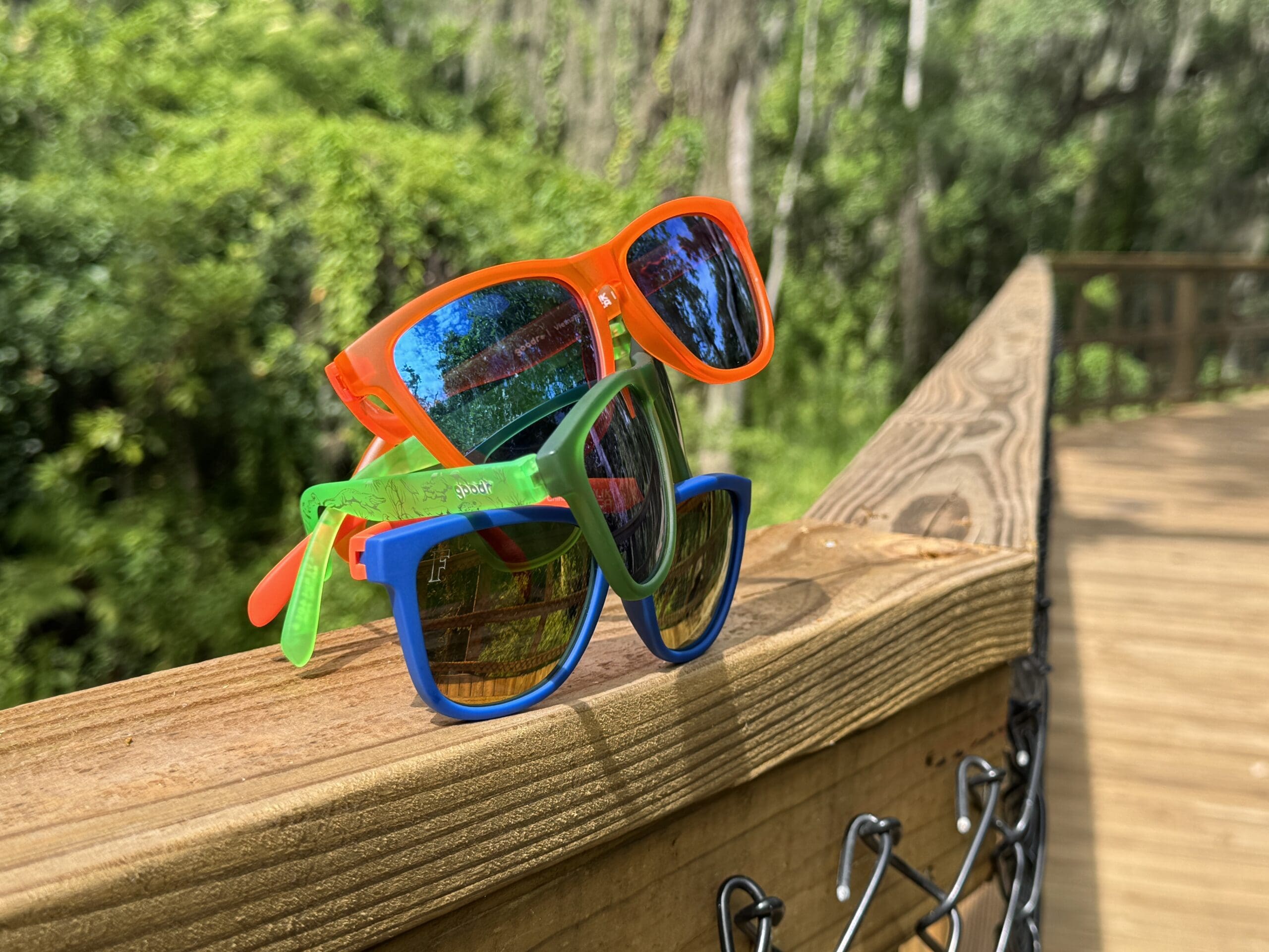 goodr sunglasses stacked on each other