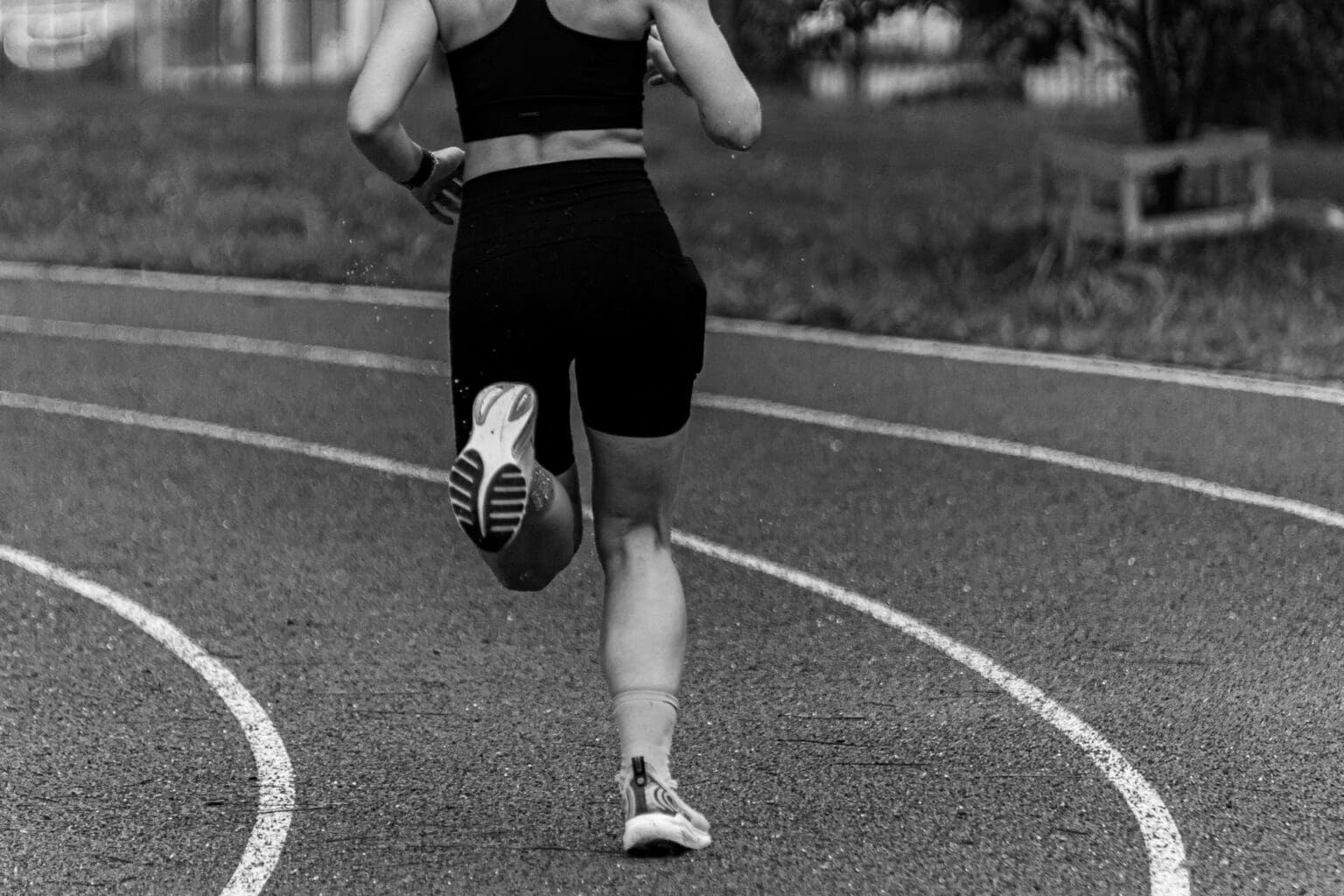 When to Replace Running Shoes: The Warning Signs girl running with slightly worn running shoes