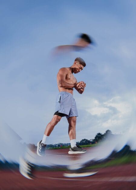 8 Best GPS Running Watches for Every Budget man about to start run looking at running watch