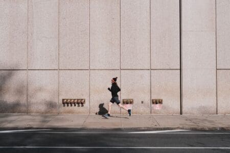 person running through city