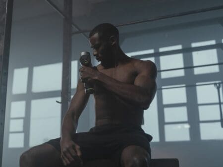 man using massage gun